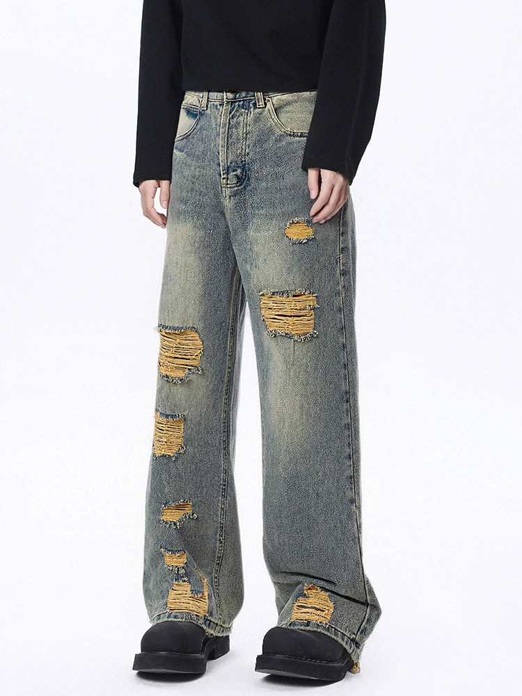 厂家直销男士宽松水洗撕裂牛仔裤，秋季高街风格，复古设计长裤