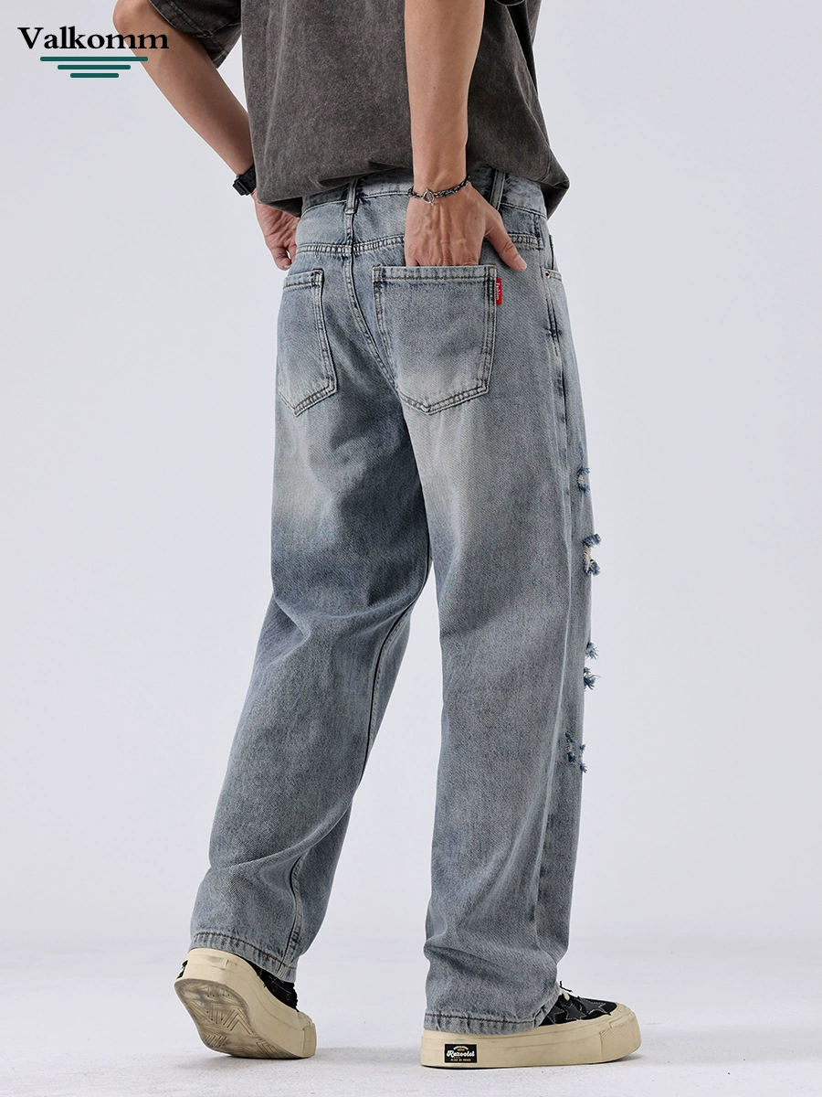 厂家直销男士宽松破洞牛仔裤，夏季休闲长裤，水洗工艺直筒设计