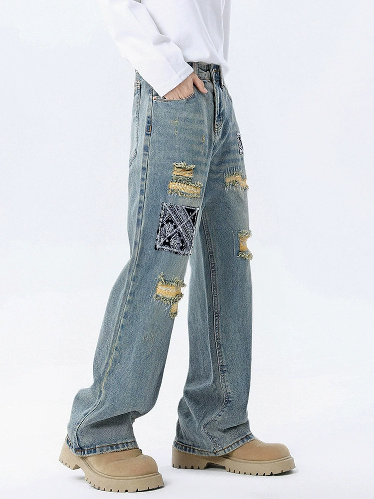 厂家直销男女同款修身贴布秋季牛仔裤，宽松休闲风格，手工磨破直筒长裤