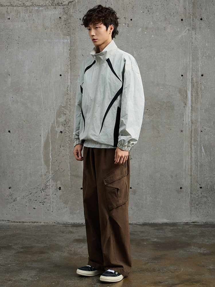 厂家直销青年男士拼接透气牛仔外套，宽松休闲风格，春秋季节，潮流拼色设计