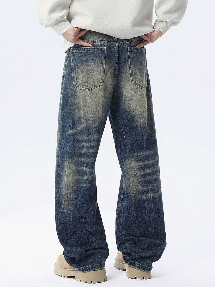 سراويل جينز فضفاضة مغسولة بتصميم مستقيم باللون الأزرق العتيق، مصنوعة من القطن المريح، مناسبة للاستخدام اليومي في فصل الربيع والخريف للشباب.