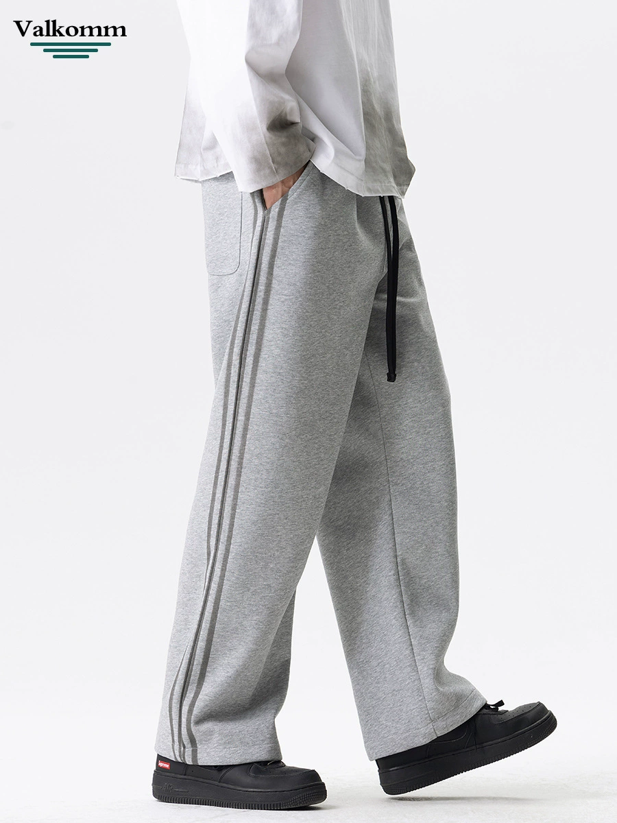 厂家直销男士修身拼接牛仔裤，秋季休闲风格，多口袋设计