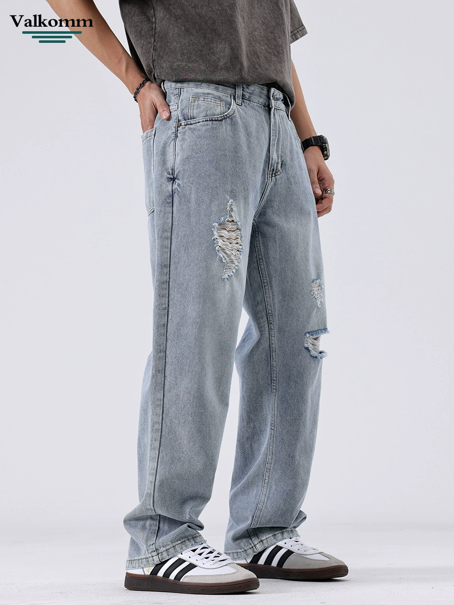 厂家直销男士宽松破洞牛仔裤，夏季休闲直筒长裤，多口袋水洗工艺