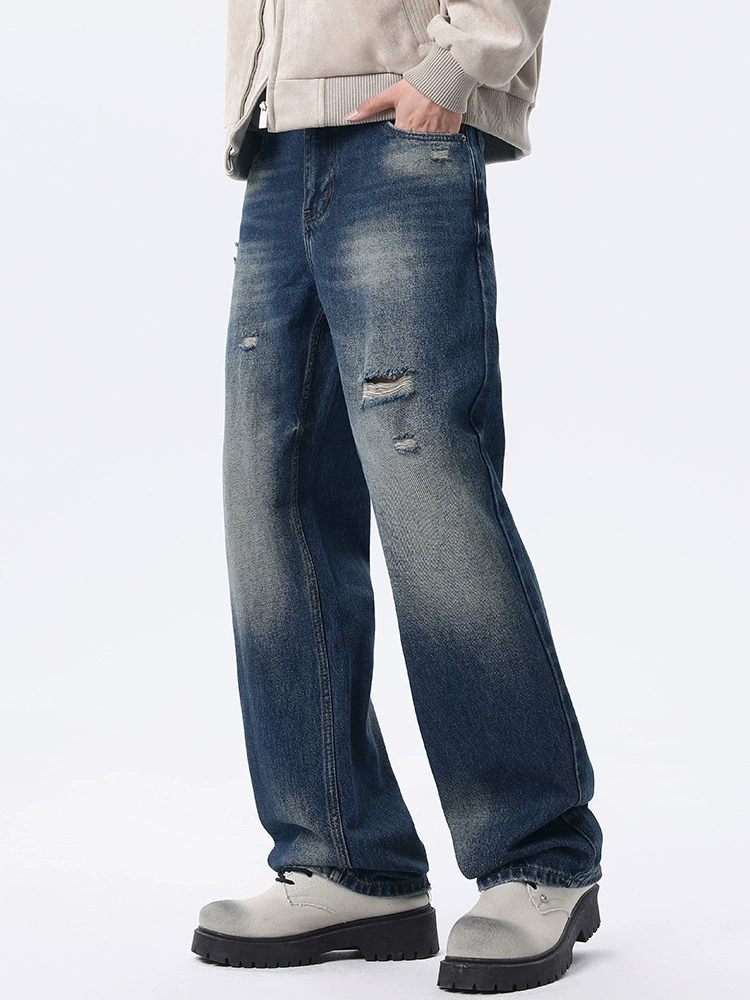 厂家直销男士水洗蓝宽松牛仔裤，复古渐变显瘦直筒设计，春秋休闲日常必备长裤，手工磨破工艺。