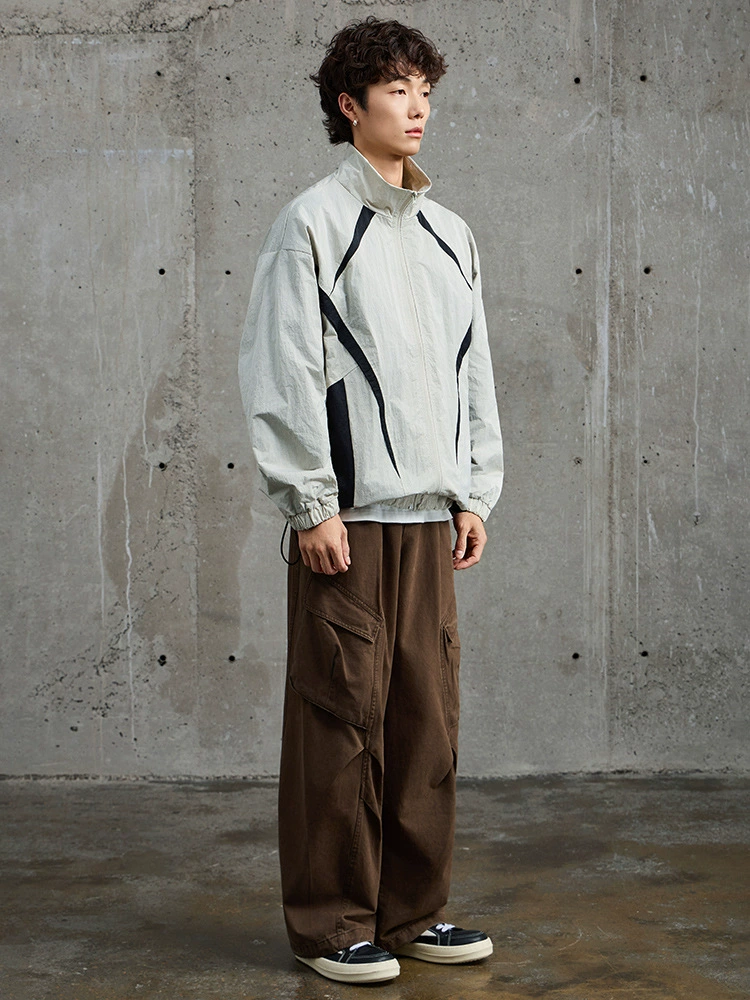 厂家直销青年男士拼接透气牛仔外套，宽松休闲风格，春秋季节，潮流拼色设计