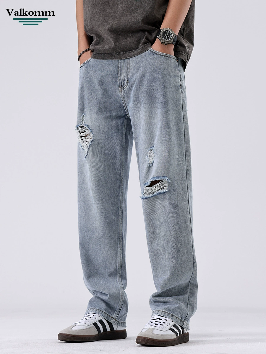 厂家直销男士宽松破洞牛仔裤，夏季休闲直筒长裤，多口袋水洗工艺