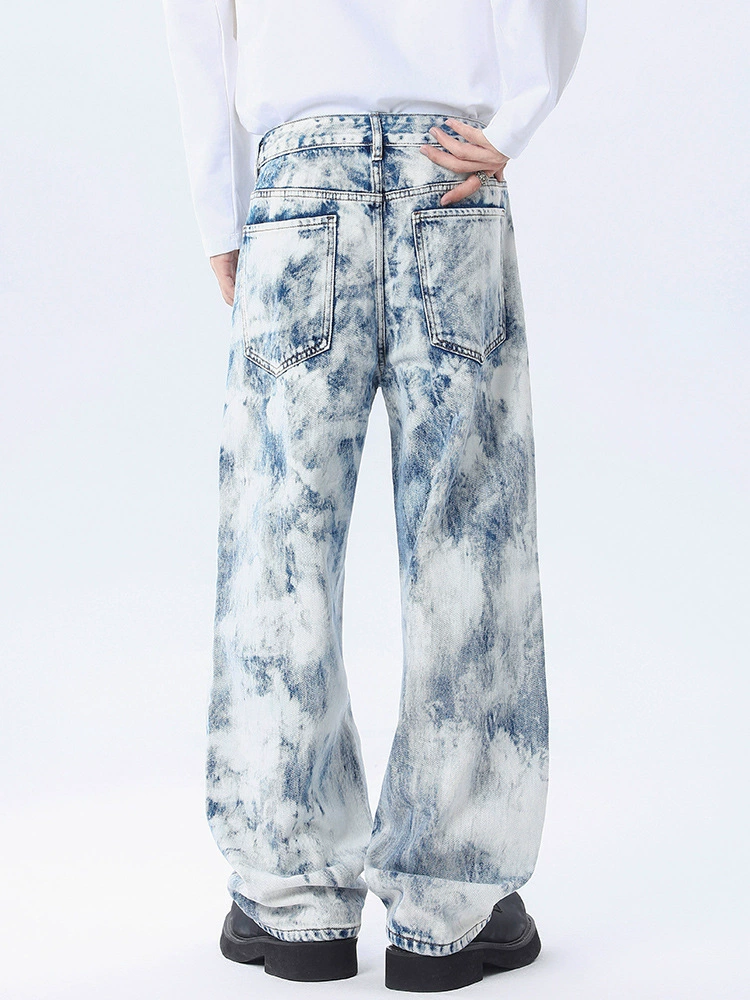 Pantalones vaqueros para hombre de estilo holgado en denim 100% algodón, diseño rasgado y teñido, adecuado para primavera y otoño, moda juvenil 2025, OEM.
