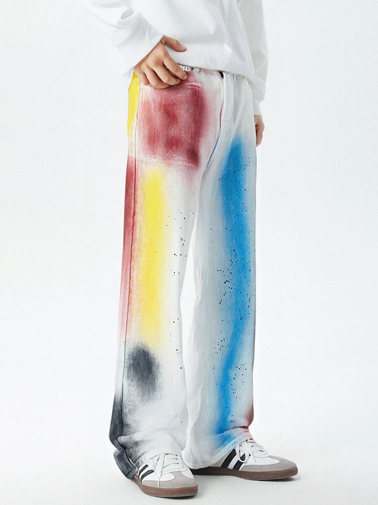 厂家直销男士宽松涂鸦牛仔裤，直筒设计，春秋休闲风格，水洗工艺，青少年潮流搭配。