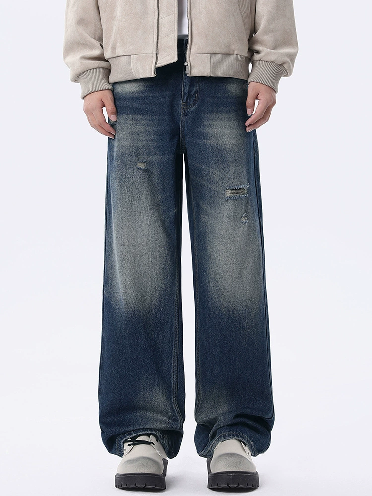 厂家直销男士水洗蓝宽松牛仔裤，复古渐变显瘦直筒设计，春秋休闲日常必备长裤，手工磨破工艺。