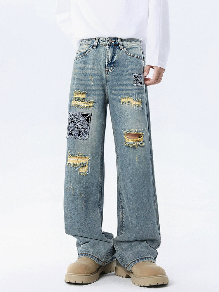 厂家直销男女同款修身贴布秋季牛仔裤，宽松休闲风格，手工磨破直筒长裤