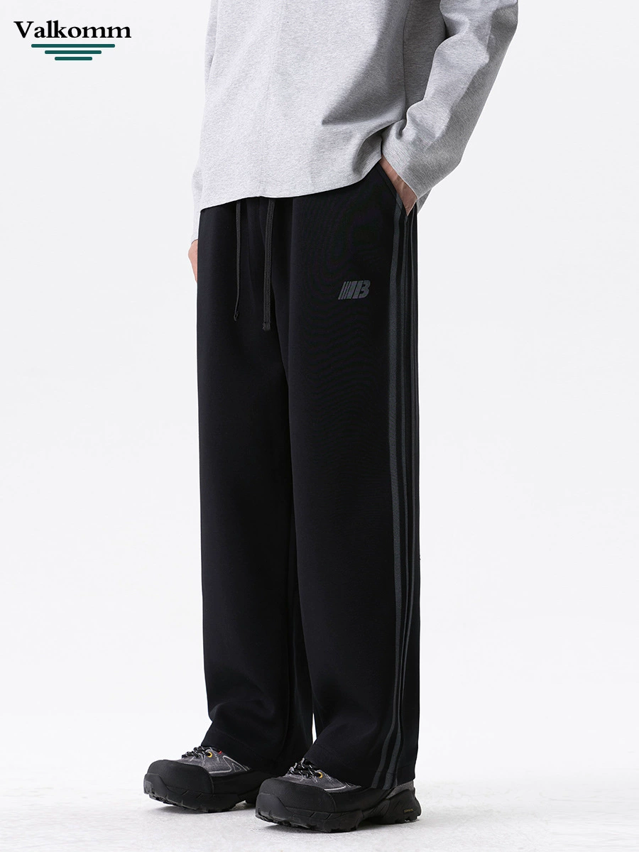 厂家直销男士修身拼接牛仔裤，秋季休闲风格，多口袋设计