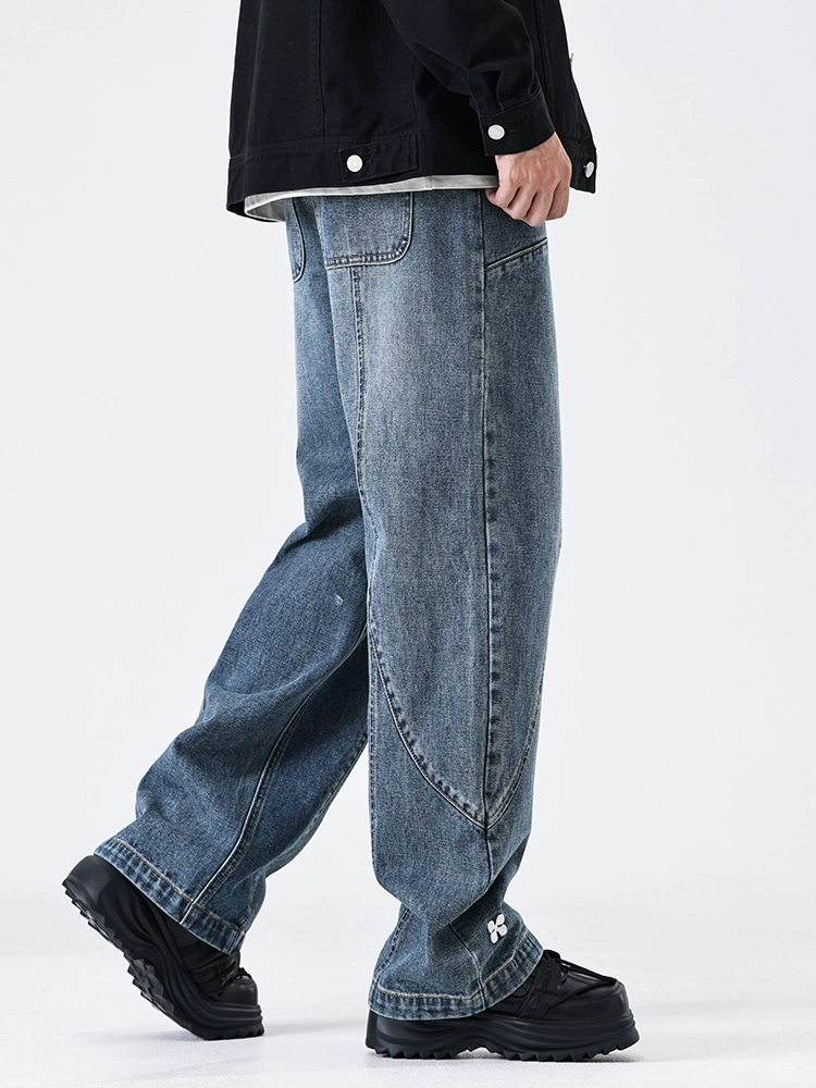 厂家直销男士复古蓝刺绣牛仔裤，修身直筒设计，春秋季休闲风格，耐磨水洗面料