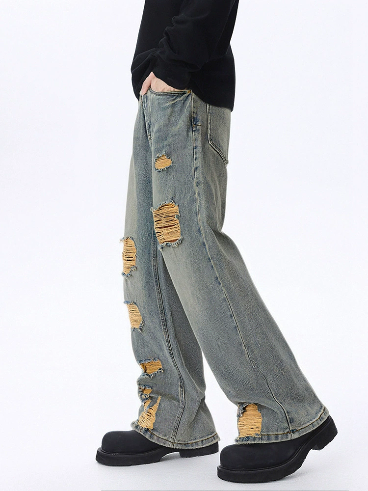 厂家直销男士宽松水洗撕裂牛仔裤，秋季高街风格，复古设计长裤