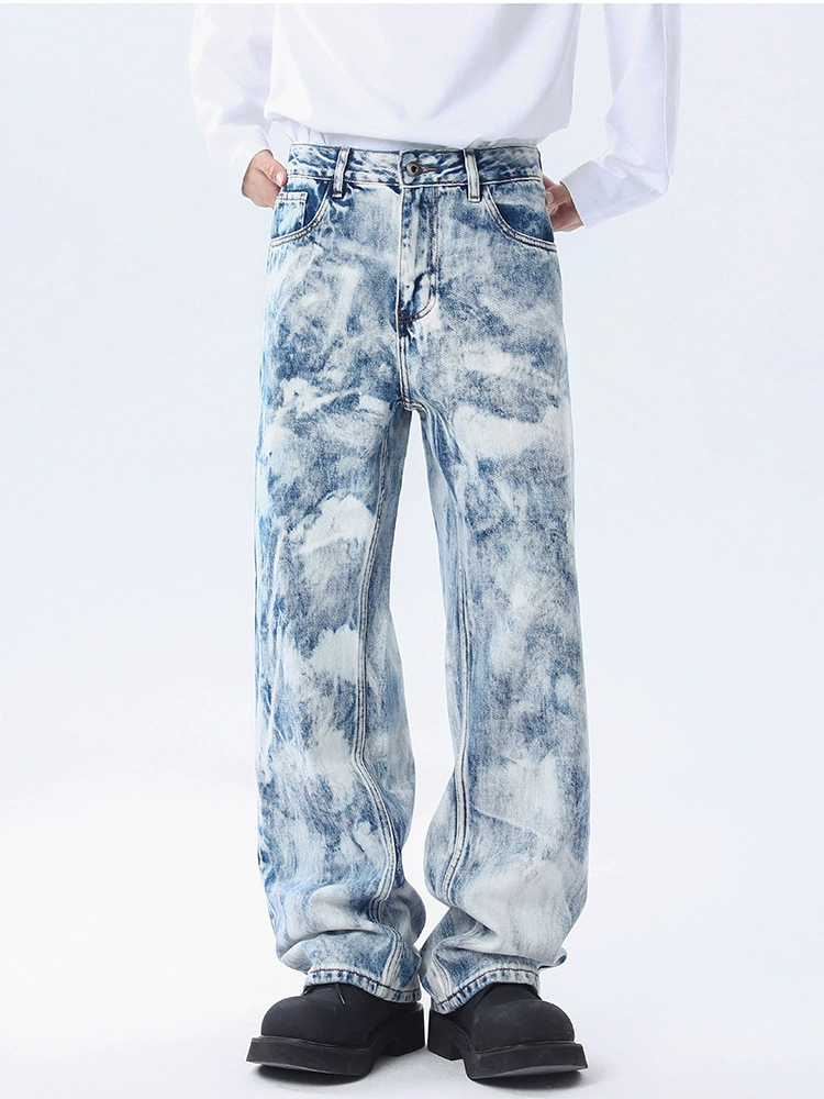 Pantalones vaqueros para hombre de estilo holgado en denim 100% algodón, diseño rasgado y teñido, adecuado para primavera y otoño, moda juvenil 2025, OEM.