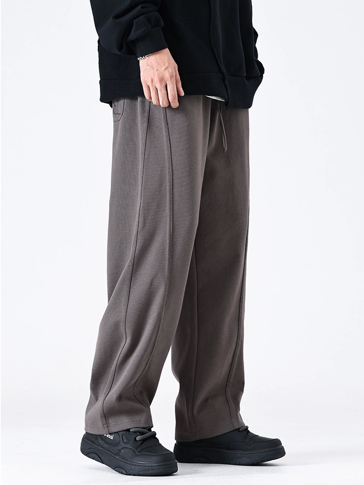 厂家直销男士宽松微弹直筒牛仔裤，秋冬休闲必备，多口袋设计